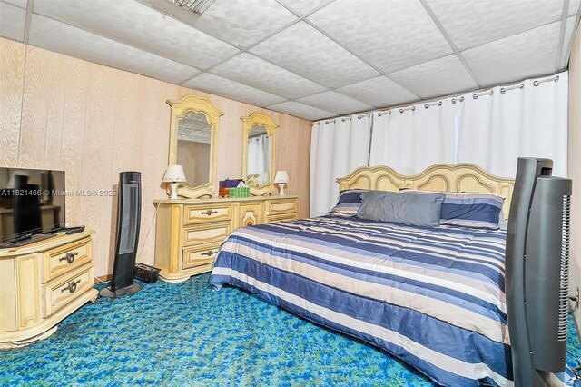 2390 Service Rd, Opa-Locka, FL 33054 - bedroom featuring dark colored carpet and a drop ceiling