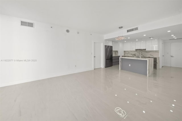 1900 N Bayshore Dr Unit 2104, Miami, FL 33132 - unfurnished living room with a sink and recessed lighting