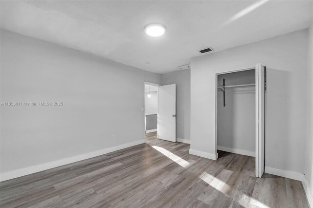4622 SW 23rd St, West Park, FL 33023 - unfurnished bedroom with wood finished floors and a closet