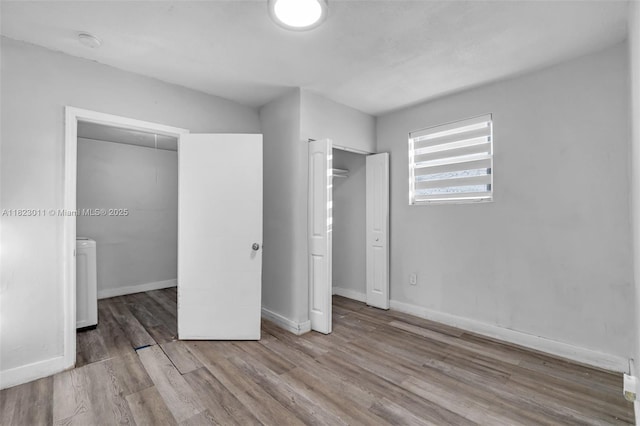 4622 SW 23rd St, West Park, FL 33023 - unfurnished bedroom featuring wood finished floors and baseboards