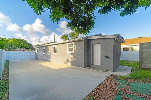 4622 SW 23rd St, West Park, FL 33023 - back of house with a fenced backyard, a patio area, and stucco siding