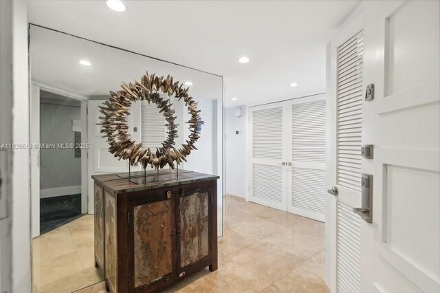 6423 Collins Ave Unit 1605, Miami Beach, FL 33141 - hallway featuring light tile patterned floors and recessed lighting