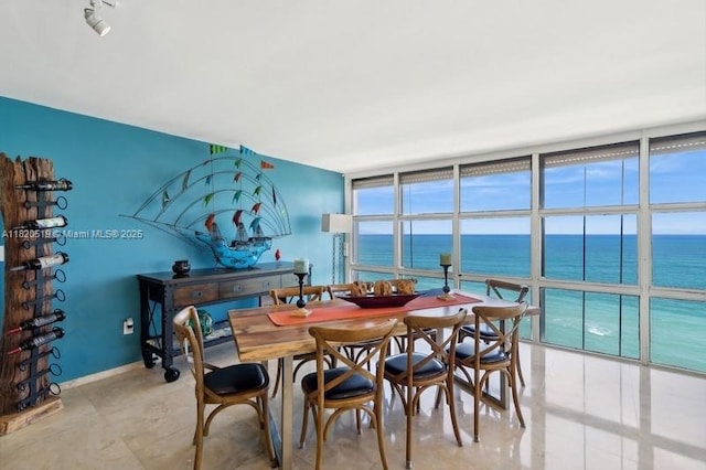 6423 Collins Ave Unit 1605, Miami Beach, FL 33141 - dining space with a water view and floor to ceiling windows