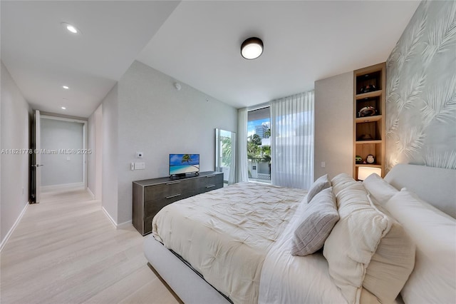 300 Collins Ave Unit 3D, Miami Beach, FL 33139 - bedroom with light wood-type flooring, access to outside, and recessed lighting