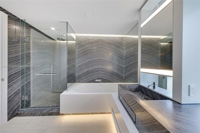 300 Collins Ave Unit 3D, Miami Beach, FL 33139 - full bath featuring a garden tub, a stall shower, and recessed lighting