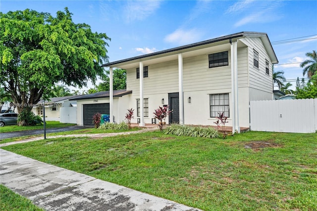 17845 SW 112th Ct, Miami, FL 33157 - view of front facade with an attached garage and asphalt driveway