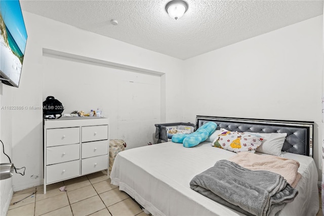 17845 SW 112th Ct, Miami, FL 33157 - bedroom featuring a textured ceiling and light tile patterned flooring