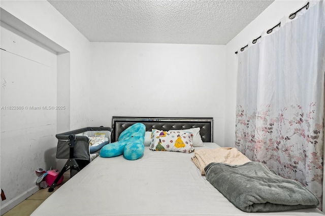 17845 SW 112th Ct, Miami, FL 33157 - bedroom featuring a textured ceiling and baseboards