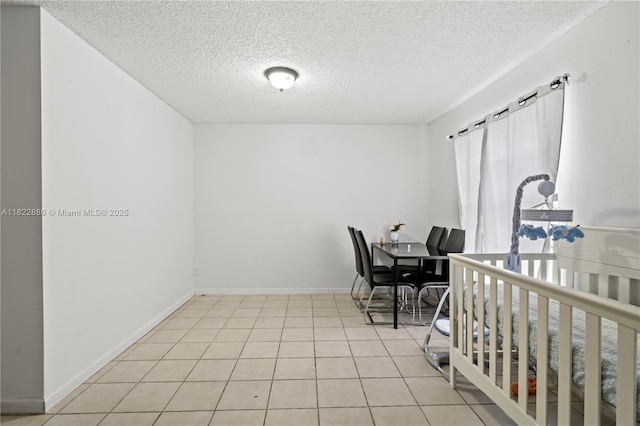 17845 SW 112th Ct, Miami, FL 33157 - bedroom with a textured ceiling and light tile patterned flooring