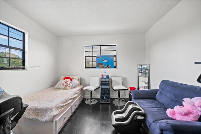 17845 SW 112th Ct, Miami, FL 33157 - bedroom featuring dark wood finished floors and a textured ceiling