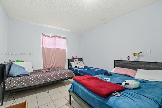 17845 SW 112th Ct, Miami, FL 33157 - bedroom featuring tile patterned floors and a textured ceiling