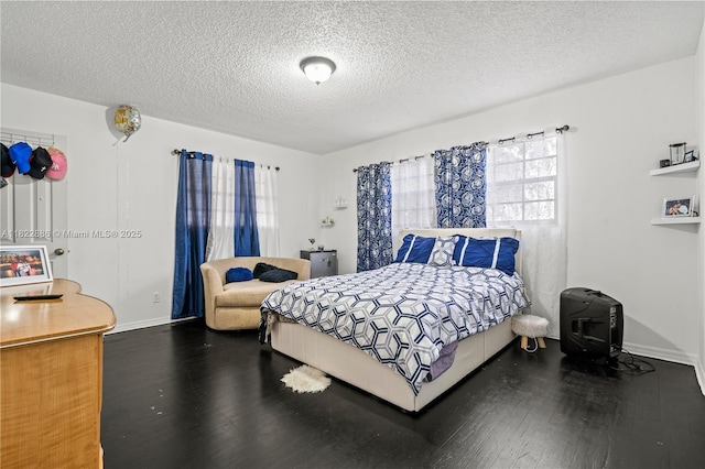 17845 SW 112th Ct, Miami, FL 33157 - bedroom featuring wood finished floors and a textured ceiling
