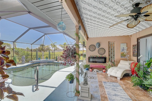 30 Bunker Ln Fl, Grove City-Rotonda, FL 33947 - swimming pool with a patio area, a ceiling fan, an outdoor living space, and a lanai