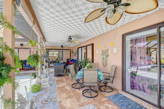 30 Bunker Ln Fl, Grove City-Rotonda, FL 33947 - sunroom / solarium with ceiling fan, an ornate ceiling, outdoor dining area, and an outdoor hangout area