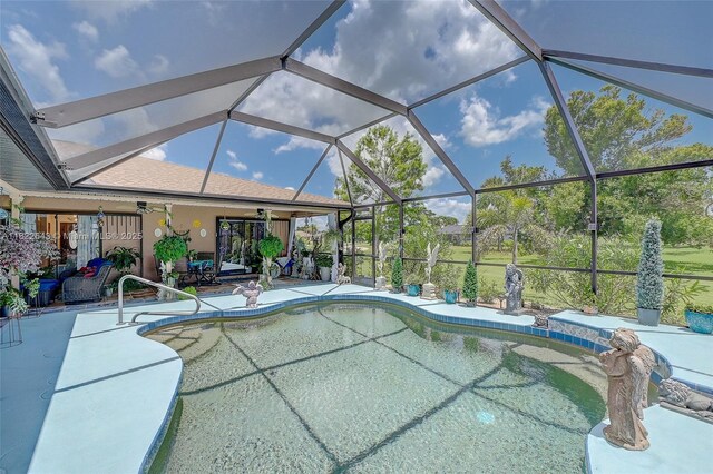30 Bunker Ln Fl, Grove City-Rotonda, FL 33947 - outdoor pool with a patio, ceiling fan, and glass enclosure