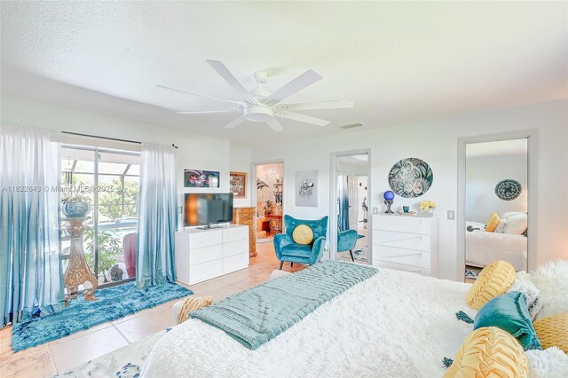 30 Bunker Ln Fl, Grove City-Rotonda, FL 33947 - bedroom featuring tile patterned flooring, access to outside, a ceiling fan, and ensuite bathroom