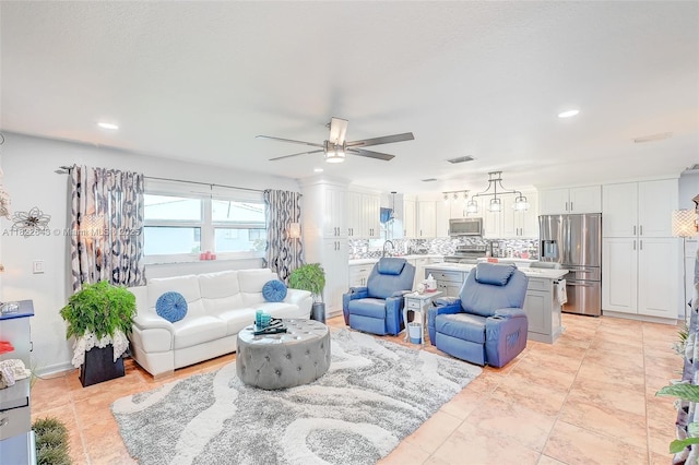 30 Bunker Ln Fl, Grove City-Rotonda, FL 33947 - living area featuring ceiling fan and recessed lighting