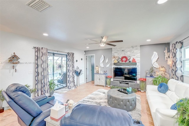 30 Bunker Ln Fl, Grove City-Rotonda, FL 33947 - living room featuring healthy amount of natural light, recessed lighting, ceiling fan, and tile patterned flooring