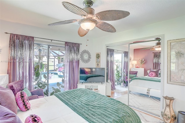 30 Bunker Ln Fl, Grove City-Rotonda, FL 33947 - bedroom featuring a closet, a ceiling fan, and access to outside