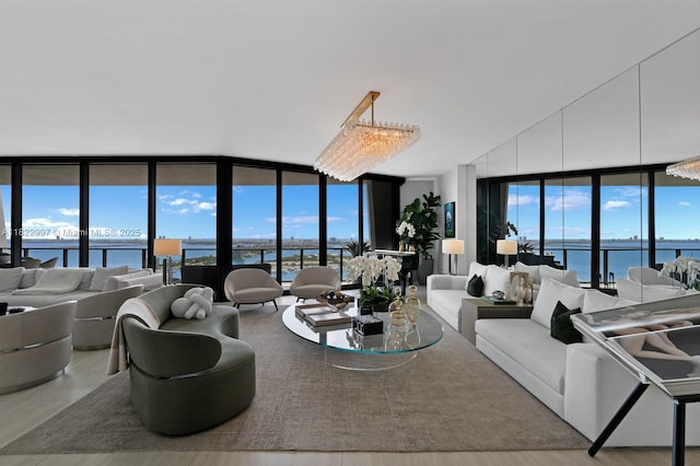1000 Biscayne Blvd Unit 3402, Miami, FL 33132 - living room featuring a wall of windows, a water view, and healthy amount of natural light