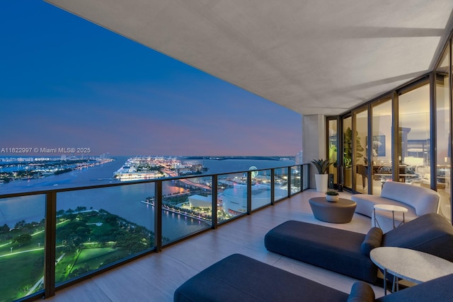 1000 Biscayne Blvd Unit 3402, Miami, FL 33132 - balcony at dusk featuring a water view