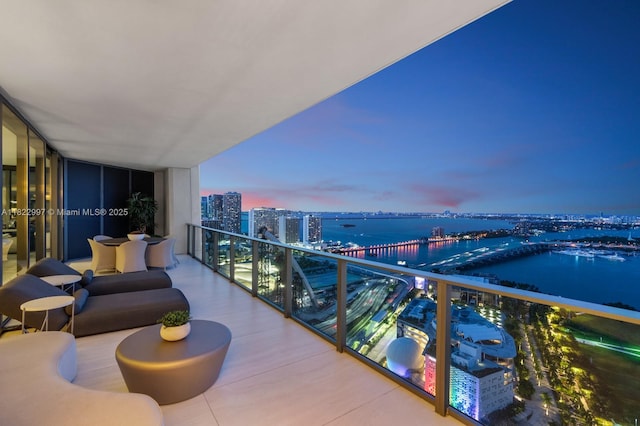 1000 Biscayne Blvd Unit 3402, Miami, FL 33132 - balcony at dusk with a water view and a view of city