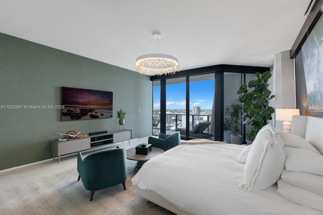 1000 Biscayne Blvd Unit 3402, Miami, FL 33132 - bedroom with expansive windows and a chandelier
