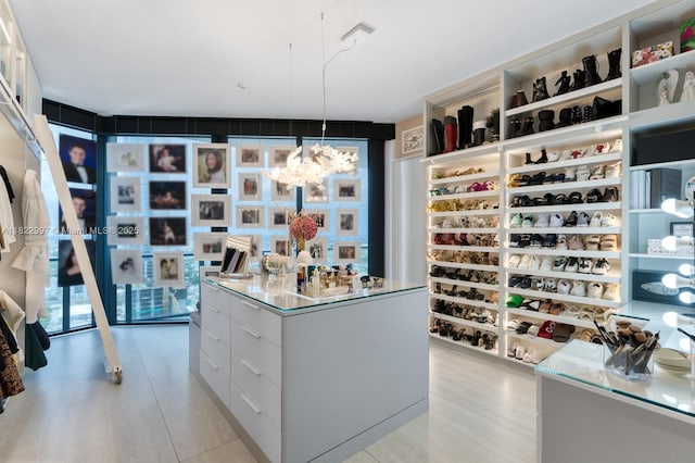 1000 Biscayne Blvd Unit 3402, Miami, FL 33132 - walk in closet featuring a chandelier