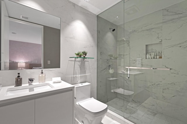 1000 Biscayne Blvd Unit 3402, Miami, FL 33132 - bathroom featuring a marble finish shower, vanity, tile walls, and marble look tile flooring
