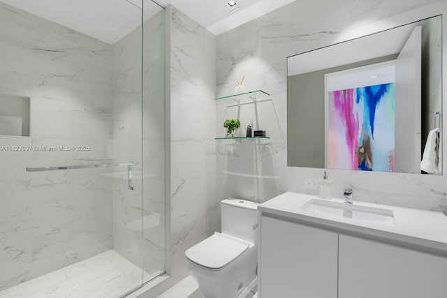 1000 Biscayne Blvd Unit 3402, Miami, FL 33132 - bathroom featuring vanity, a marble finish shower, and tile walls
