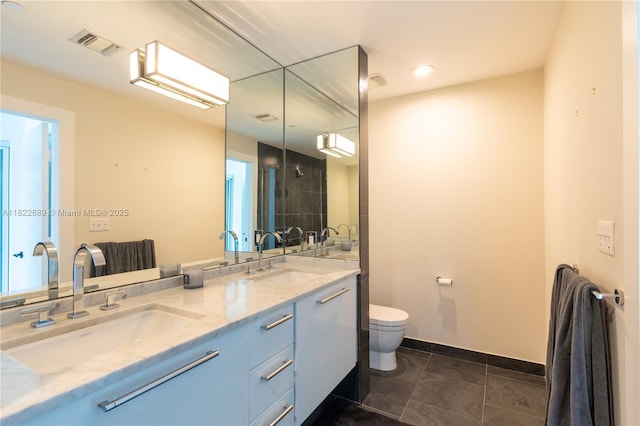 900 Biscayne Blvd Unit 2210, Miami, FL 33132 - full bath featuring double vanity, a tile shower, and recessed lighting