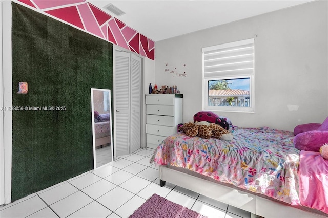 19801 NE 1st Ave, Miami, FL 33179 - tiled bedroom with a closet