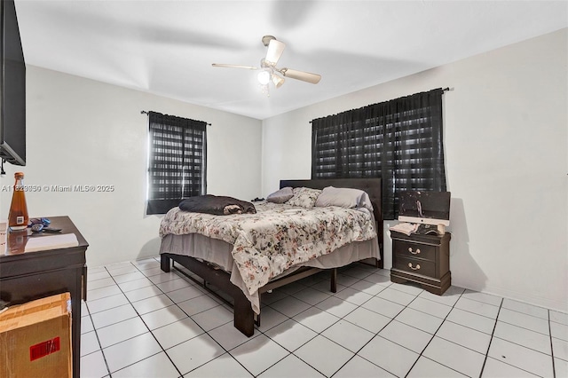 19801 NE 1st Ave, Miami, FL 33179 - bedroom featuring light tile patterned flooring and ceiling fan