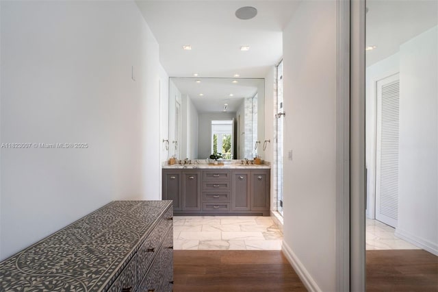 220 Cypress Dr, Key Biscayne, FL 33149 - hall with light marble finish floors and a sink