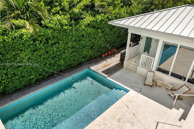 220 Cypress Dr, Key Biscayne, FL 33149 - swimming pool with a patio