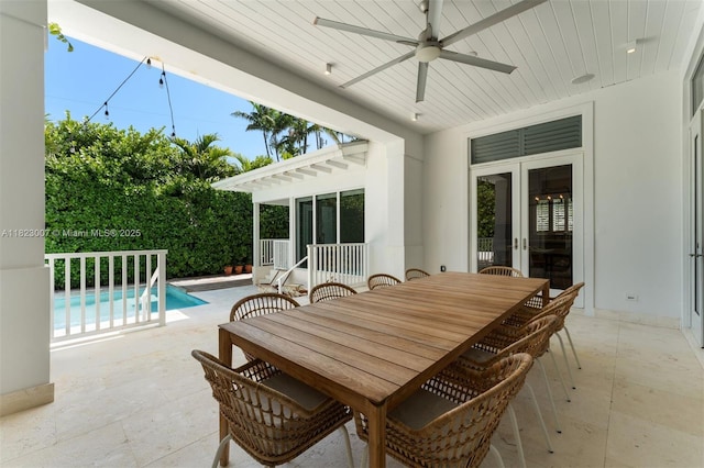 220 Cypress Dr, Key Biscayne, FL 33149 - view of patio with french doors, ceiling fan, an outdoor pool, and outdoor dining space