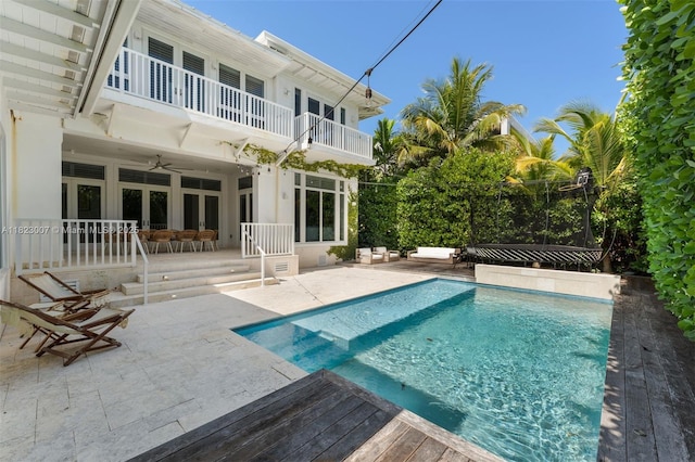 220 Cypress Dr, Key Biscayne, FL 33149 - swimming pool featuring a patio and ceiling fan