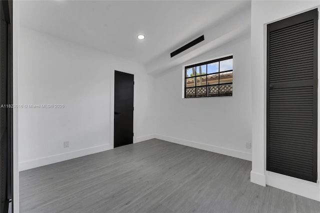 2413 Gulfstream Ln, Fort Lauderdale, FL 33312 - unfurnished room with wood finished floors and recessed lighting