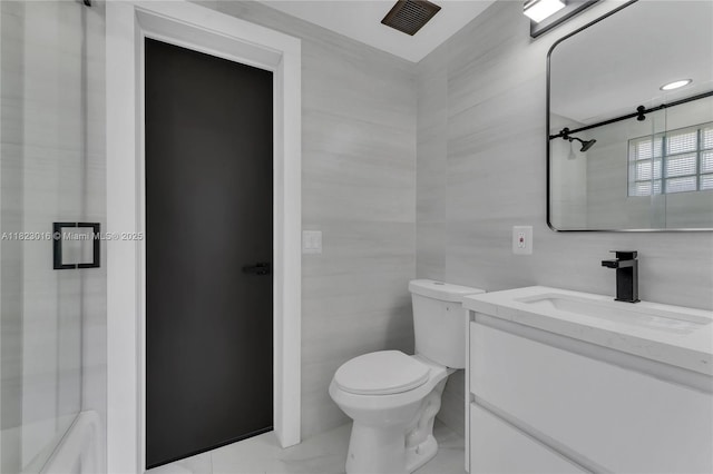 2413 Gulfstream Ln, Fort Lauderdale, FL 33312 - full bath featuring vanity, tile walls, a shower, and marble finish floors