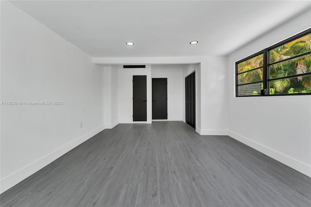 2413 Gulfstream Ln, Fort Lauderdale, FL 33312 - unfurnished room with dark wood-style floors and recessed lighting