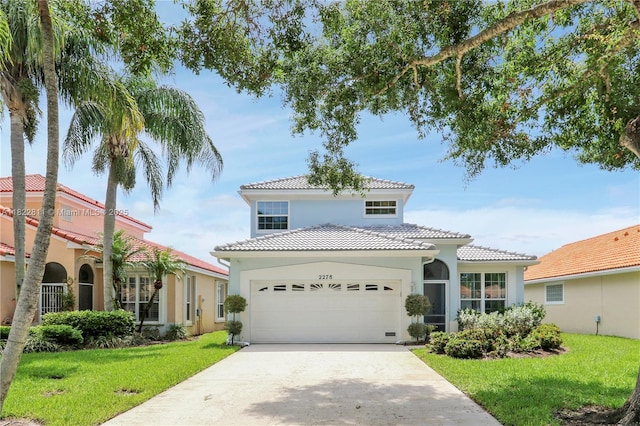 2278 SW Olympic Club Ter, Palm City, FL 34990 - mediterranean / spanish-style home featuring a tiled roof, a garage, stucco siding, and a front lawn