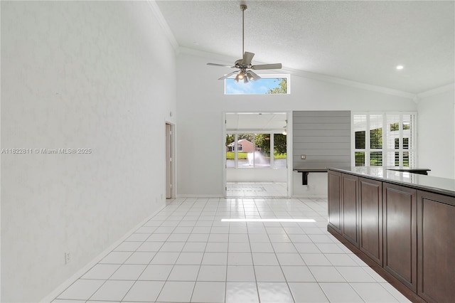 2278 SW Olympic Club Ter, Palm City, FL 34990 - hall with crown molding, vaulted ceiling, light tile patterned flooring, and a textured ceiling