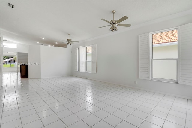 2278 SW Olympic Club Ter, Palm City, FL 34990 - spare room with ceiling fan, light tile patterned floors, crown molding, and lofted ceiling