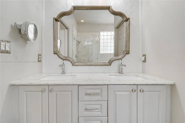 2278 SW Olympic Club Ter, Palm City, FL 34990 - bathroom with a shower stall and double vanity