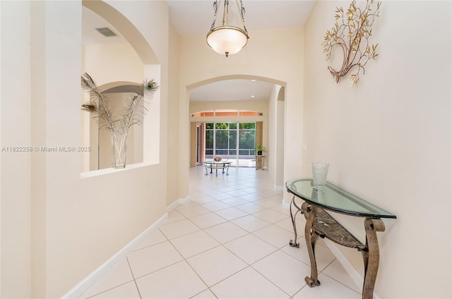 1001 SW 189th Ave, Pembroke Pines, FL 33029 - hallway featuring arched walkways and light tile patterned floors
