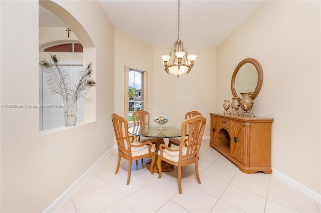1001 SW 189th Ave, Pembroke Pines, FL 33029 - dining area featuring a chandelier, arched walkways, and light tile patterned flooring