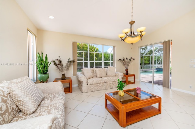 1001 SW 189th Ave, Pembroke Pines, FL 33029 - living area featuring a chandelier, healthy amount of natural light, light tile patterned floors, and recessed lighting