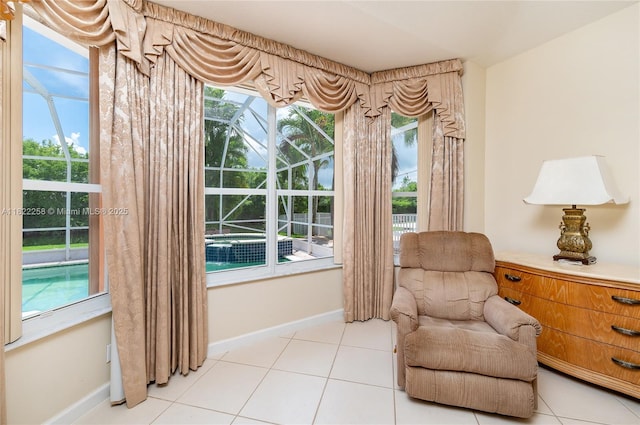 1001 SW 189th Ave, Pembroke Pines, FL 33029 - living area featuring baseboards and tile patterned flooring