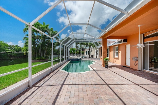 1001 SW 189th Ave, Pembroke Pines, FL 33029 - view of swimming pool with a patio area, a pool with connected hot tub, a yard, and glass enclosure