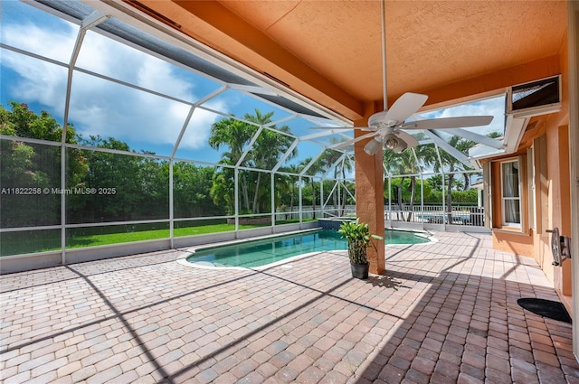 1001 SW 189th Ave, Pembroke Pines, FL 33029 - view of swimming pool featuring a patio area, glass enclosure, and a pool with connected hot tub